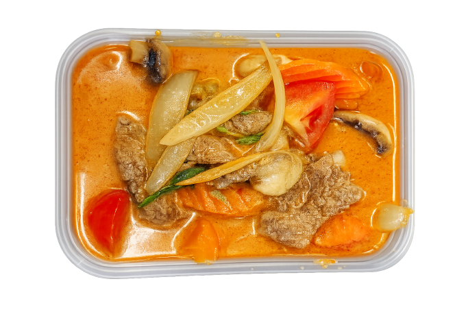 Tom Yum soup in a takeaway container